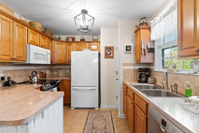 Welcome to this charming coastal 3 bedroom, 2 bath residence in on Lockwood Folly Country Club in North Carolina - for sale on GolfHomes.com, golf home, golf lot