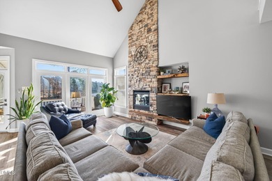 Wake up to breathtaking panoramic lake views from this on River Golf and Country Club at Lake Royale in North Carolina - for sale on GolfHomes.com, golf home, golf lot