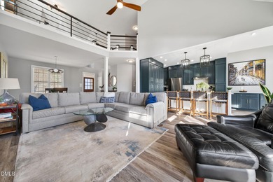 Wake up to breathtaking panoramic lake views from this on River Golf and Country Club at Lake Royale in North Carolina - for sale on GolfHomes.com, golf home, golf lot