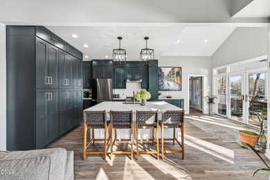 Wake up to breathtaking panoramic lake views from this on River Golf and Country Club at Lake Royale in North Carolina - for sale on GolfHomes.com, golf home, golf lot