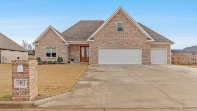 All Brick beautiful home with bonus and three car garage on a on Paragould Country Club in Arkansas - for sale on GolfHomes.com, golf home, golf lot