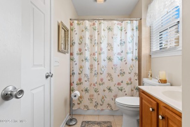 Welcome to this charming coastal 3 bedroom, 2 bath residence in on Lockwood Folly Country Club in North Carolina - for sale on GolfHomes.com, golf home, golf lot
