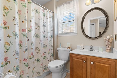 Welcome to this charming coastal 3 bedroom, 2 bath residence in on Lockwood Folly Country Club in North Carolina - for sale on GolfHomes.com, golf home, golf lot