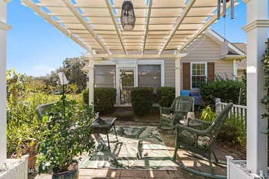 Welcome to this charming coastal 3 bedroom, 2 bath residence in on Lockwood Folly Country Club in North Carolina - for sale on GolfHomes.com, golf home, golf lot