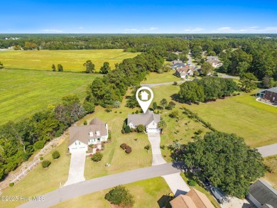 Welcome to this charming coastal 3 bedroom, 2 bath residence in on Lockwood Folly Country Club in North Carolina - for sale on GolfHomes.com, golf home, golf lot