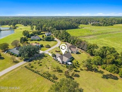 Welcome to this charming coastal 3 bedroom, 2 bath residence in on Lockwood Folly Country Club in North Carolina - for sale on GolfHomes.com, golf home, golf lot