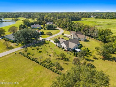 Welcome to this charming coastal 3 bedroom, 2 bath residence in on Lockwood Folly Country Club in North Carolina - for sale on GolfHomes.com, golf home, golf lot