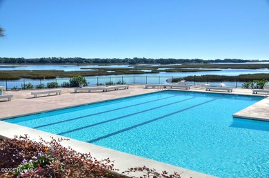 Welcome to this charming coastal 3 bedroom, 2 bath residence in on Lockwood Folly Country Club in North Carolina - for sale on GolfHomes.com, golf home, golf lot