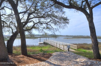 Welcome to this charming coastal 3 bedroom, 2 bath residence in on Lockwood Folly Country Club in North Carolina - for sale on GolfHomes.com, golf home, golf lot