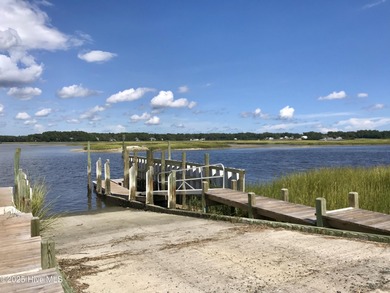 Welcome to this charming coastal 3 bedroom, 2 bath residence in on Lockwood Folly Country Club in North Carolina - for sale on GolfHomes.com, golf home, golf lot
