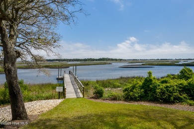 Welcome to this charming coastal 3 bedroom, 2 bath residence in on Lockwood Folly Country Club in North Carolina - for sale on GolfHomes.com, golf home, golf lot