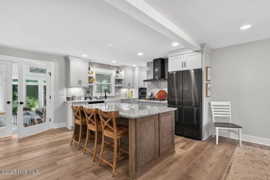Prepare to be captivated by this extraordinary coastal sanctuary on The Lakes Country Club in North Carolina - for sale on GolfHomes.com, golf home, golf lot