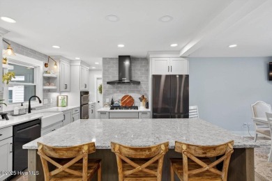 Prepare to be captivated by this extraordinary coastal sanctuary on The Lakes Country Club in North Carolina - for sale on GolfHomes.com, golf home, golf lot