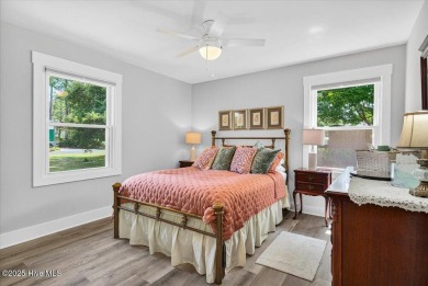 Prepare to be captivated by this extraordinary coastal sanctuary on The Lakes Country Club in North Carolina - for sale on GolfHomes.com, golf home, golf lot