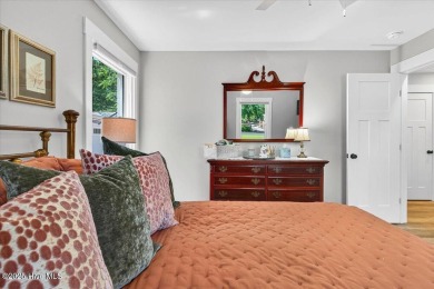 Prepare to be captivated by this extraordinary coastal sanctuary on The Lakes Country Club in North Carolina - for sale on GolfHomes.com, golf home, golf lot