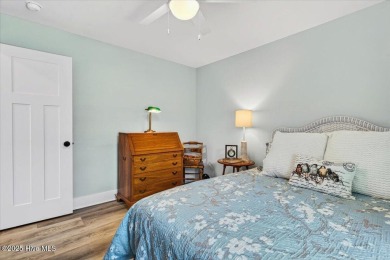 Prepare to be captivated by this extraordinary coastal sanctuary on The Lakes Country Club in North Carolina - for sale on GolfHomes.com, golf home, golf lot