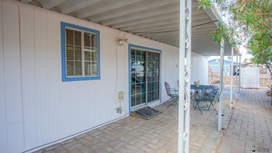 Foothills home with mountain views! This spacious doublewide on Las Barrancas Golf Course in Arizona - for sale on GolfHomes.com, golf home, golf lot