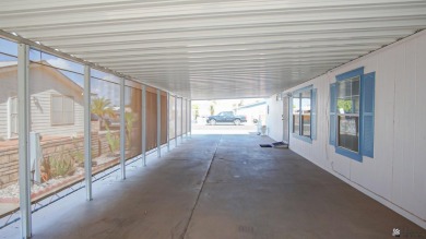 Foothills home with mountain views! This spacious doublewide on Las Barrancas Golf Course in Arizona - for sale on GolfHomes.com, golf home, golf lot