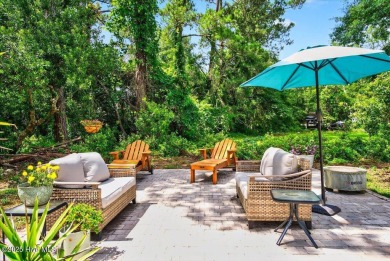 Prepare to be captivated by this extraordinary coastal sanctuary on The Lakes Country Club in North Carolina - for sale on GolfHomes.com, golf home, golf lot