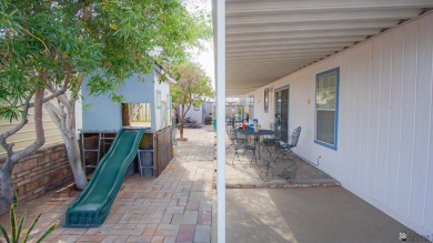 Foothills home with mountain views! This spacious doublewide on Las Barrancas Golf Course in Arizona - for sale on GolfHomes.com, golf home, golf lot