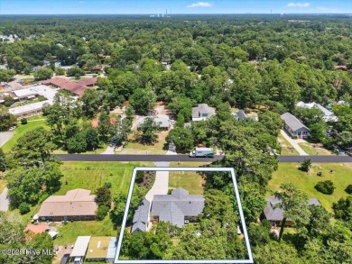 Prepare to be captivated by this extraordinary coastal sanctuary on The Lakes Country Club in North Carolina - for sale on GolfHomes.com, golf home, golf lot