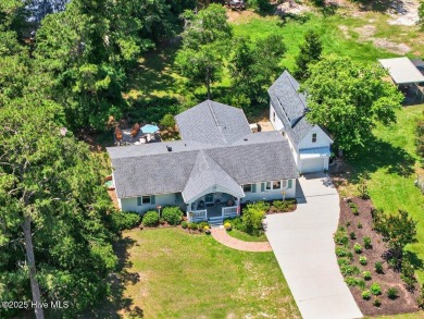 Prepare to be captivated by this extraordinary coastal sanctuary on The Lakes Country Club in North Carolina - for sale on GolfHomes.com, golf home, golf lot