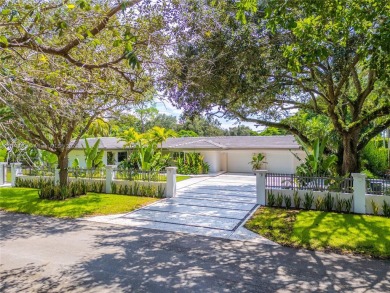 Tastefully remodeled estate overlooking the 15th hole of the on Riviera Country Club in Florida - for sale on GolfHomes.com, golf home, golf lot