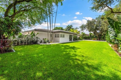 Tastefully remodeled estate overlooking the 15th hole of the on Riviera Country Club in Florida - for sale on GolfHomes.com, golf home, golf lot