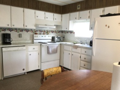 Meticulously maintained home in the much sought after community on Spanish Lakes I in Florida - for sale on GolfHomes.com, golf home, golf lot
