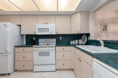 Enjoy spectacular golf views from this centrally located condo on Capri Isle Golf Club in Florida - for sale on GolfHomes.com, golf home, golf lot