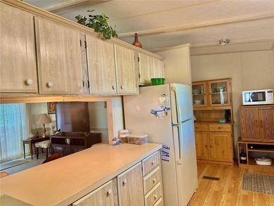 Beautifully maintained 2-bedroom, 2-bathroom home in the on High Point Golf Club, Inc. in Florida - for sale on GolfHomes.com, golf home, golf lot