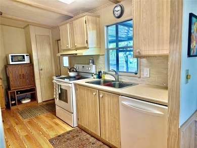 Beautifully maintained 2-bedroom, 2-bathroom home in the on High Point Golf Club, Inc. in Florida - for sale on GolfHomes.com, golf home, golf lot