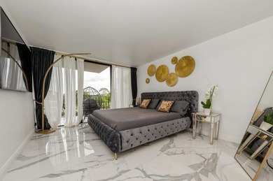 Welcome to 1830 Embassy Drive # 503, an impeccably renovated on The President Country Club in Florida - for sale on GolfHomes.com, golf home, golf lot