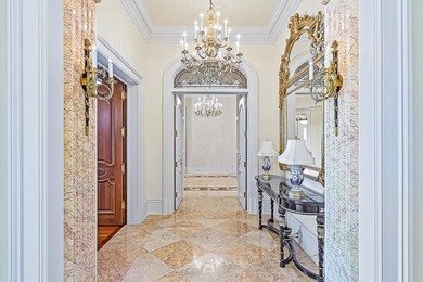 Introducing a palatial waterfront estate on a double lot in the on Jonathans Landing Golf Club in Florida - for sale on GolfHomes.com, golf home, golf lot