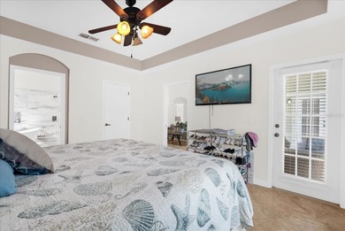 Experience golf course living at its finest in this beautifully on Hunters Creek Golf Course in Florida - for sale on GolfHomes.com, golf home, golf lot