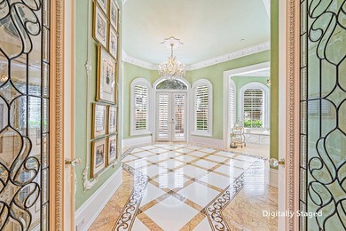 Introducing a palatial waterfront estate on a double lot in the on Jonathans Landing Golf Club in Florida - for sale on GolfHomes.com, golf home, golf lot