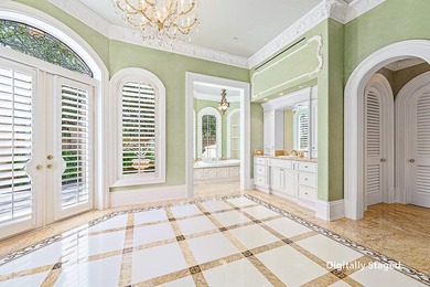 Introducing a palatial waterfront estate on a double lot in the on Jonathans Landing Golf Club in Florida - for sale on GolfHomes.com, golf home, golf lot