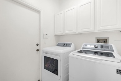 Experience golf course living at its finest in this beautifully on Hunters Creek Golf Course in Florida - for sale on GolfHomes.com, golf home, golf lot