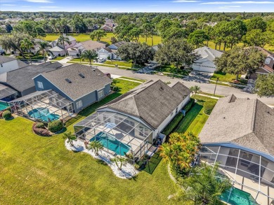 Experience golf course living at its finest in this beautifully on Hunters Creek Golf Course in Florida - for sale on GolfHomes.com, golf home, golf lot