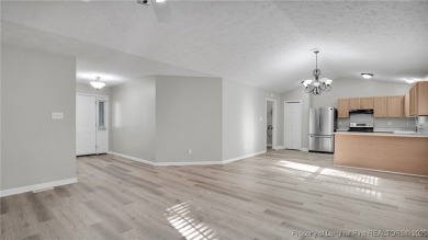 Welcome to this beautifully maintained 3-bedroom, 2-bathroom on Carolina Lakes Country Club in North Carolina - for sale on GolfHomes.com, golf home, golf lot