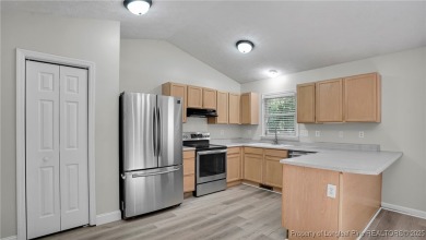 Welcome to this beautifully maintained 3-bedroom, 2-bathroom on Carolina Lakes Country Club in North Carolina - for sale on GolfHomes.com, golf home, golf lot