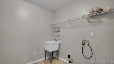 Welcome to this beautifully maintained 3-bedroom, 2-bathroom on Carolina Lakes Country Club in North Carolina - for sale on GolfHomes.com, golf home, golf lot