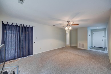 Nestled in one of Hampstead's most desirable neighborhoods, this on Belvedere Country Club in North Carolina - for sale on GolfHomes.com, golf home, golf lot