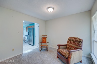 Nestled in one of Hampstead's most desirable neighborhoods, this on Belvedere Country Club in North Carolina - for sale on GolfHomes.com, golf home, golf lot