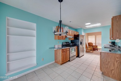 Nestled in one of Hampstead's most desirable neighborhoods, this on Belvedere Country Club in North Carolina - for sale on GolfHomes.com, golf home, golf lot