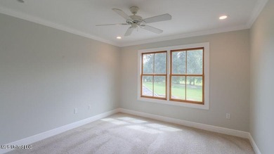 Luxurious custom built home located on the 1st hole in the on The Oaks Golf Club in Mississippi - for sale on GolfHomes.com, golf home, golf lot