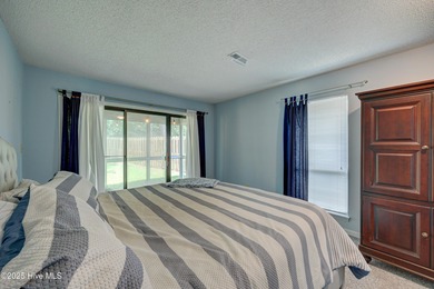 Nestled in one of Hampstead's most desirable neighborhoods, this on Belvedere Country Club in North Carolina - for sale on GolfHomes.com, golf home, golf lot