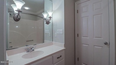 Luxurious custom built home located on the 1st hole in the on The Oaks Golf Club in Mississippi - for sale on GolfHomes.com, golf home, golf lot