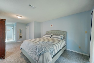 Nestled in one of Hampstead's most desirable neighborhoods, this on Belvedere Country Club in North Carolina - for sale on GolfHomes.com, golf home, golf lot