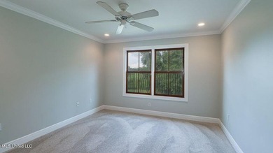 Luxurious custom built home located on the 1st hole in the on The Oaks Golf Club in Mississippi - for sale on GolfHomes.com, golf home, golf lot